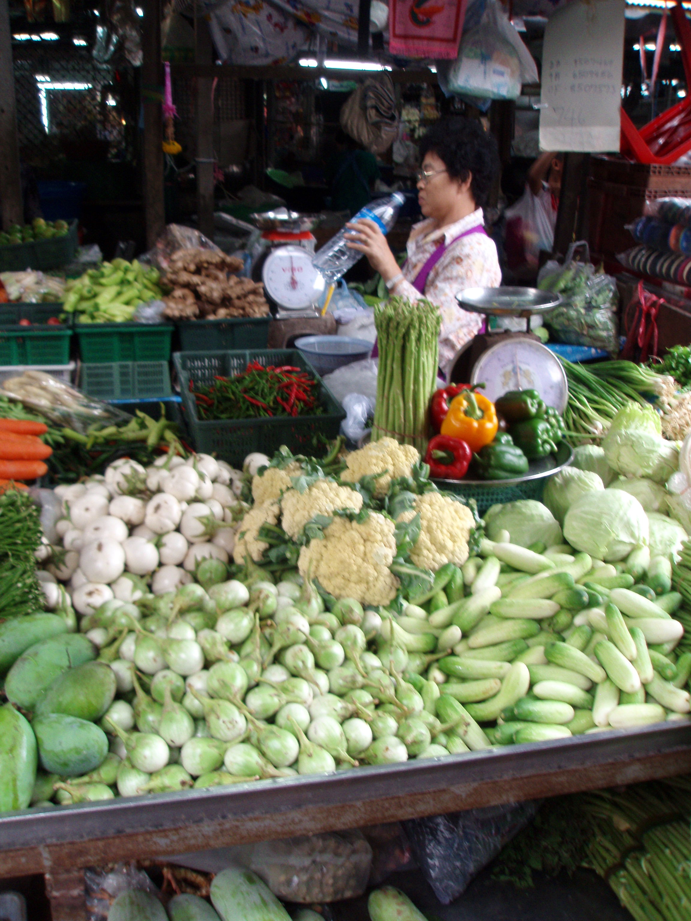 Mercado de Maeklong, por Olga